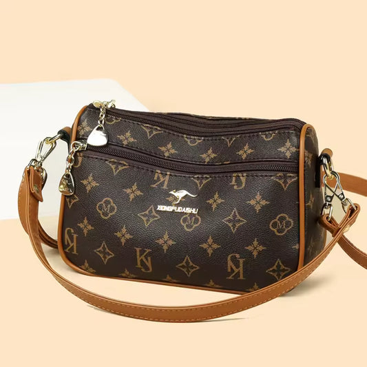 Women's shoulder bag in PU leather with an exclusive design.